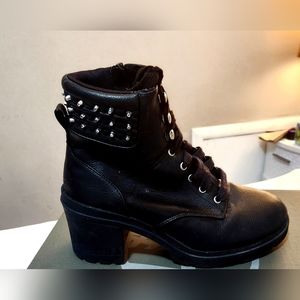 Black lace-up boots with silver spikes and memory foam insoles. Size 9 wide